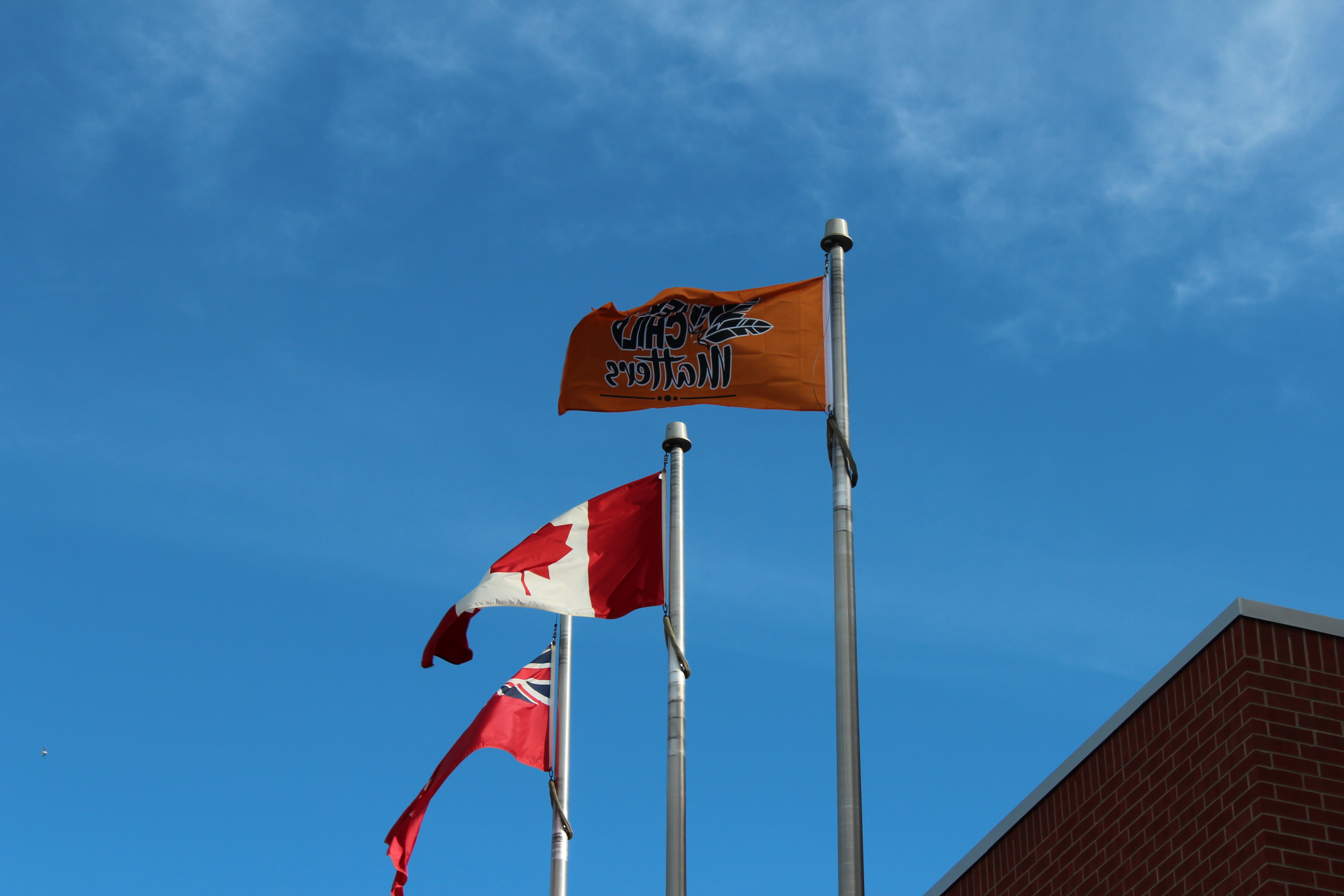 Every Child Matters flag flying at OCAB